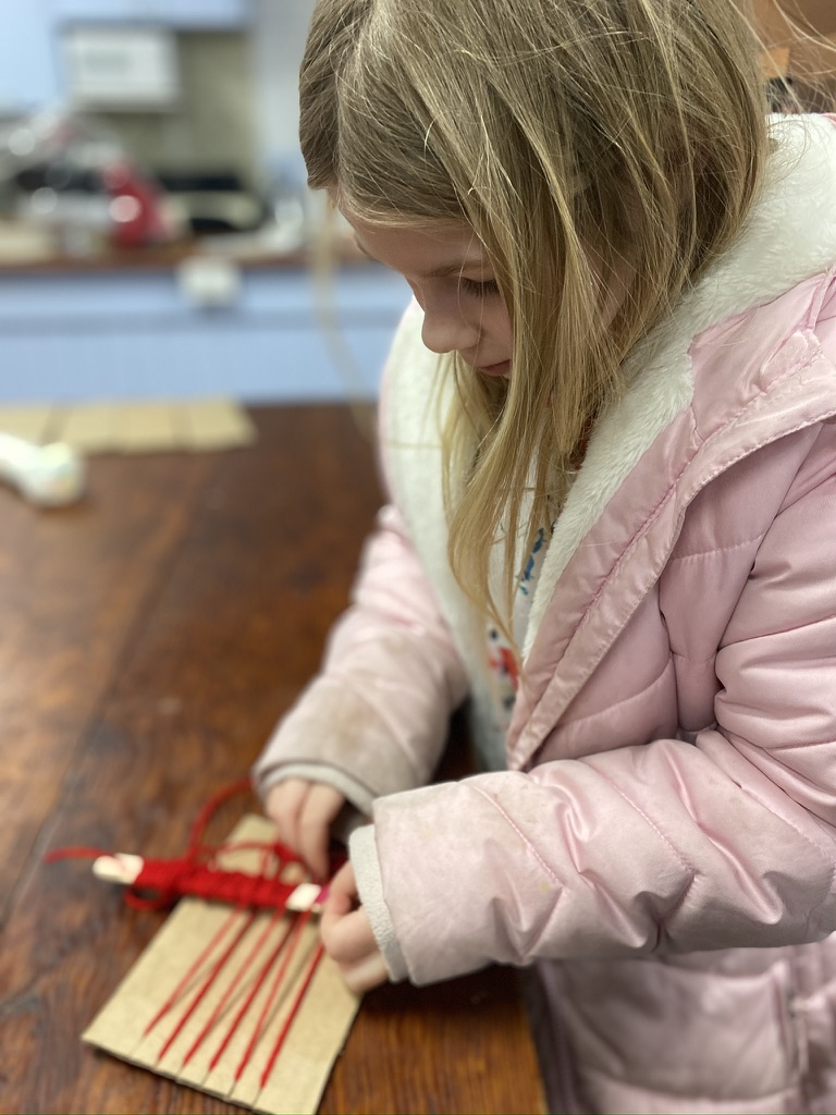 Hand Weaving with a Cardboard Loom.